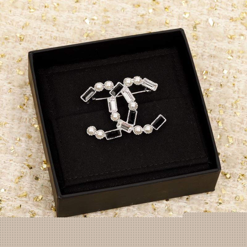Ch*el brooches